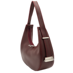 Selena burgundy vegan leather hobo bag side profile with silver hardware